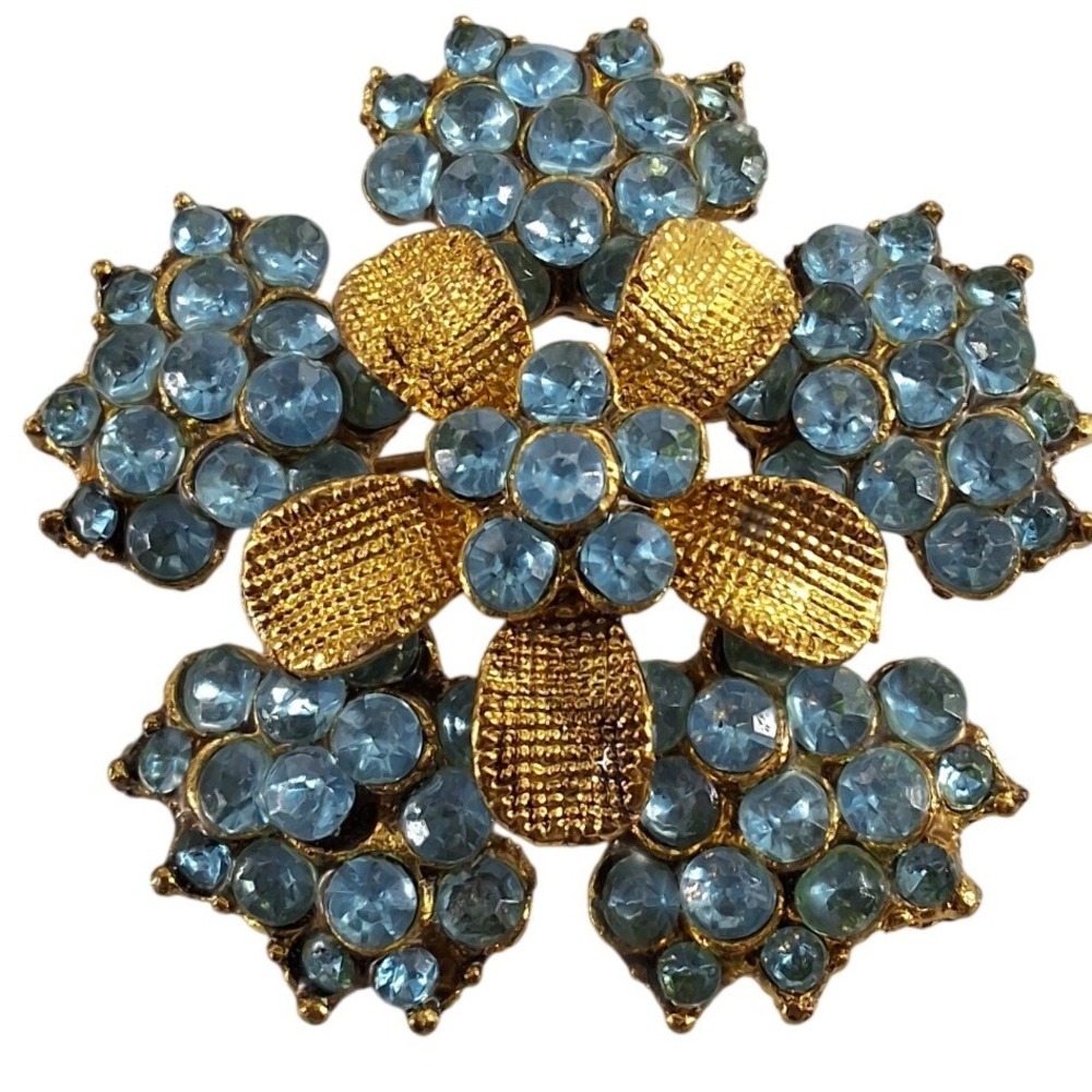 Vintage 60s Blue Rhinestone Flower Brooch Gold Tone Textured Floral Pin 2"
